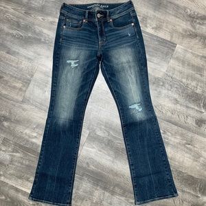 Boot cut distress jeans